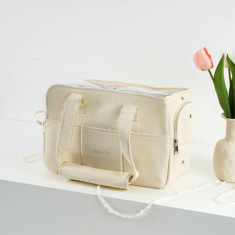 Beige pet carrier with a pink tulip on a white background