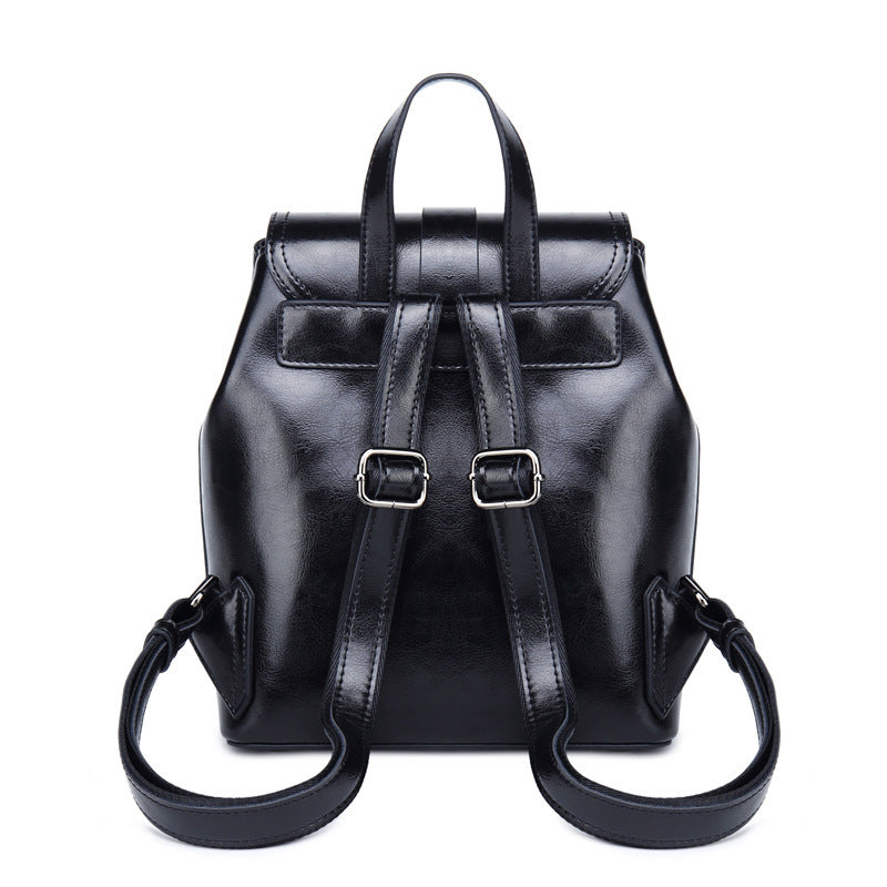 Black backpack with a drawstring on a white background