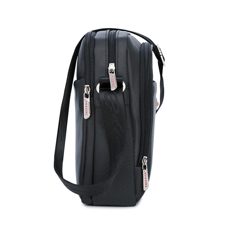 Black backpack with visible brand logo on a white background