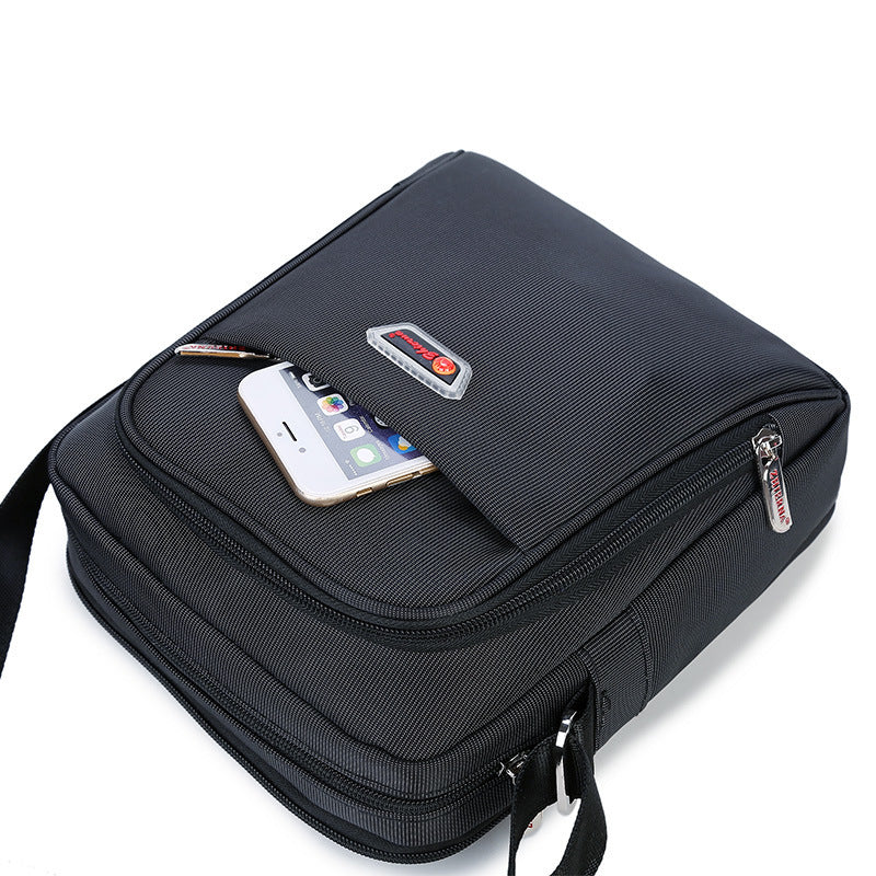 Black bag with a phone inside on a white background